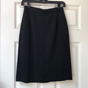 Black calf length skirt, wool & polyester size 6 , the slits in front and back
